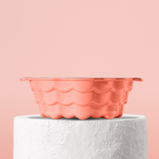 Profesionální forma na bábovku z litiny, smaltovaná úprava pro snadné vyndávání. Barva: pastelově oranžová.